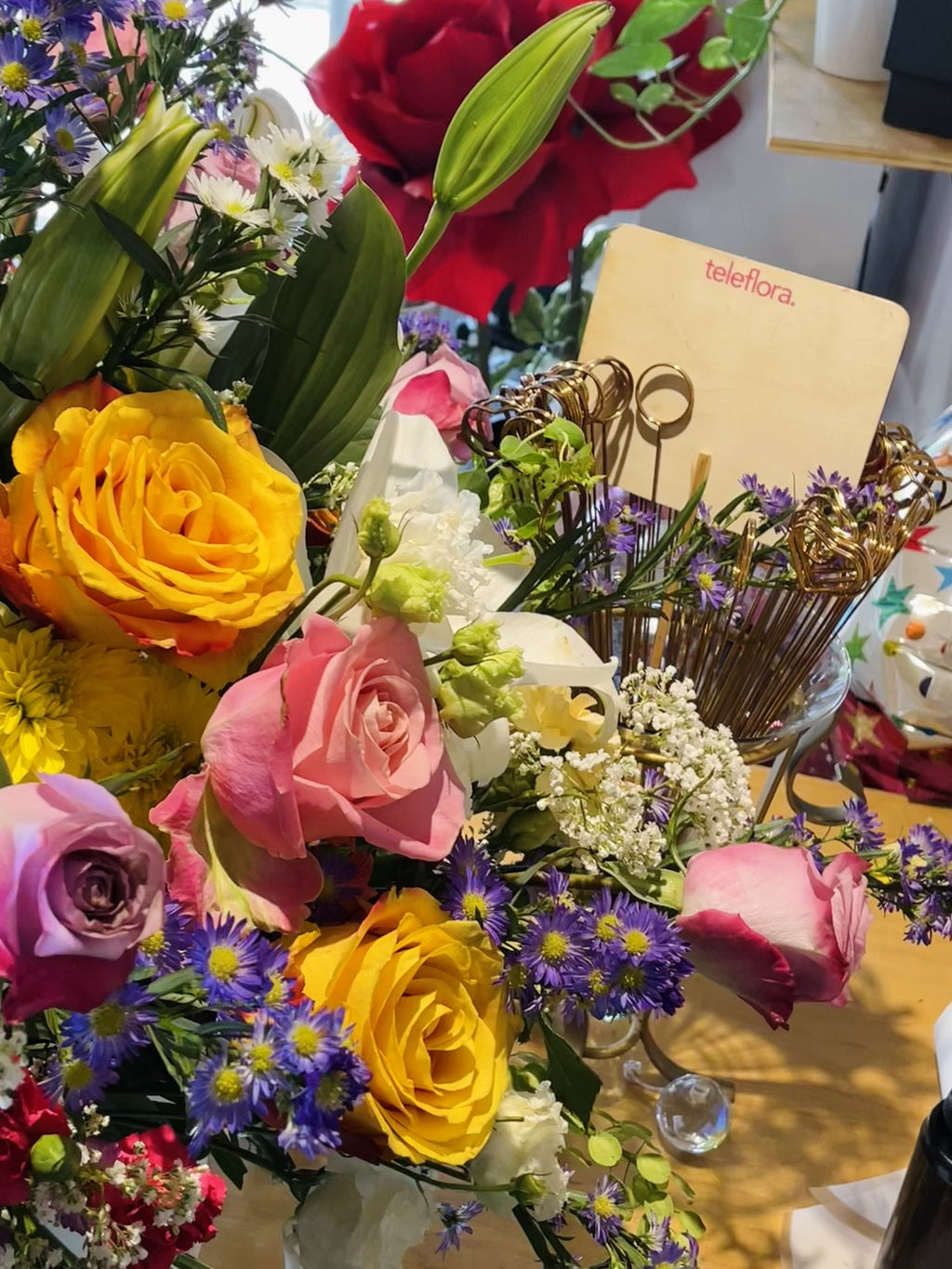 Peacock Blooms: A Colorful Floral Arrangement