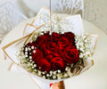 12 Red roses wrapped - Tramonti Flowers & Events